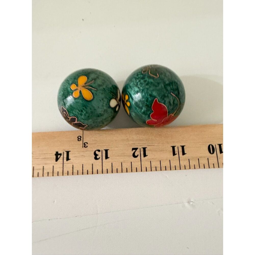 pair of vintage cloisonne enamel musical massage balls with floral designs